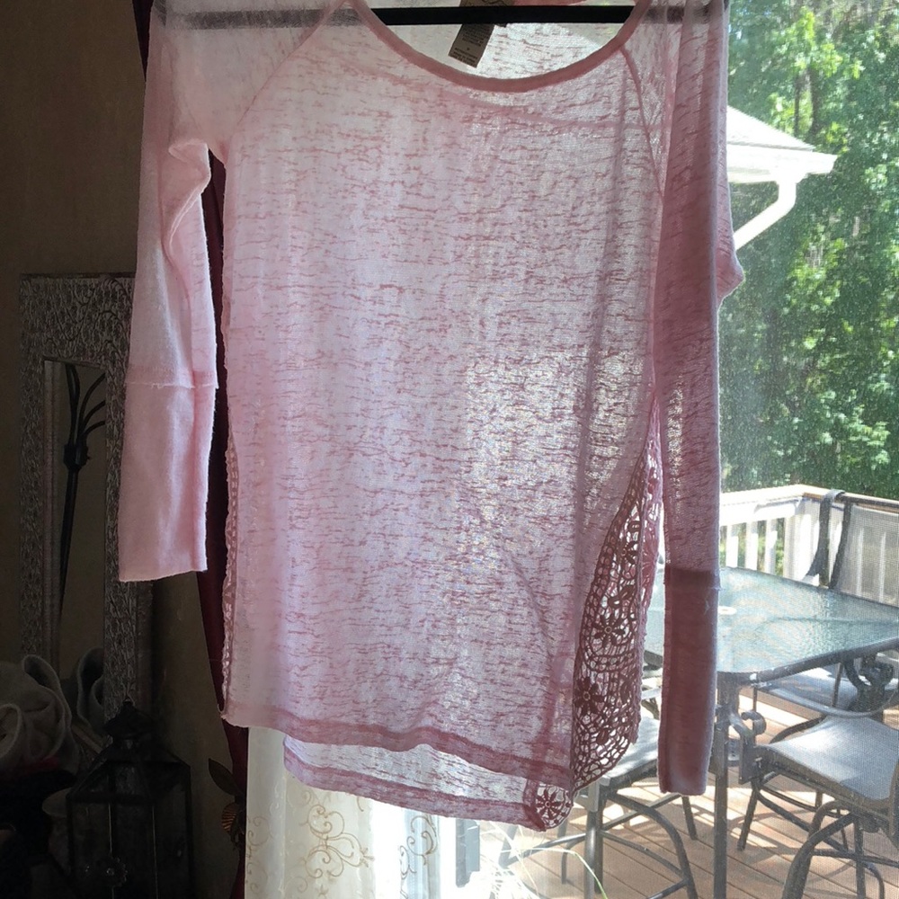 Pink long sleeve top with crochet detail on sides